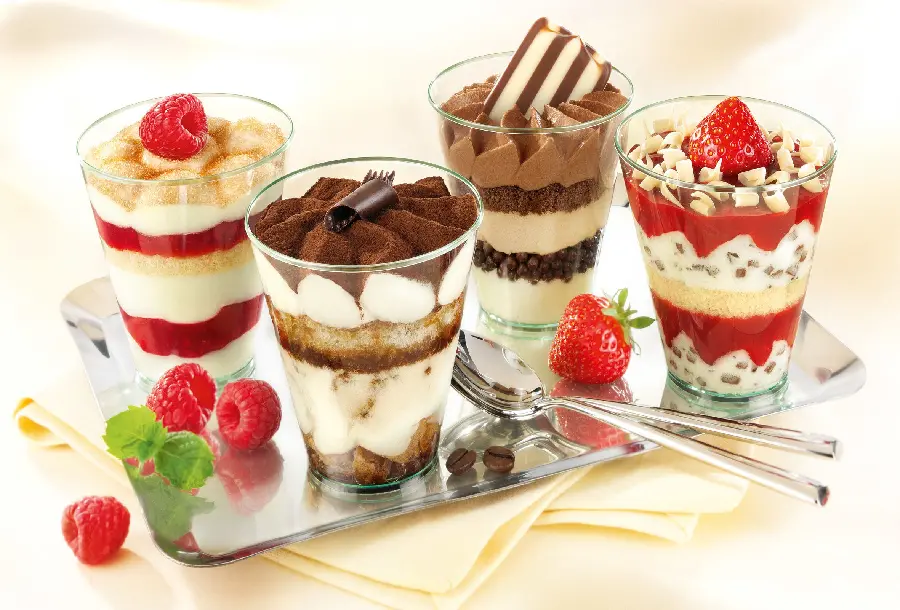 Delicious glass dessert photo with chocolate and strawberry decoration