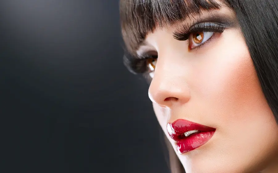 Beautiful girl with doll hair and thick makeup, incredibly beautiful