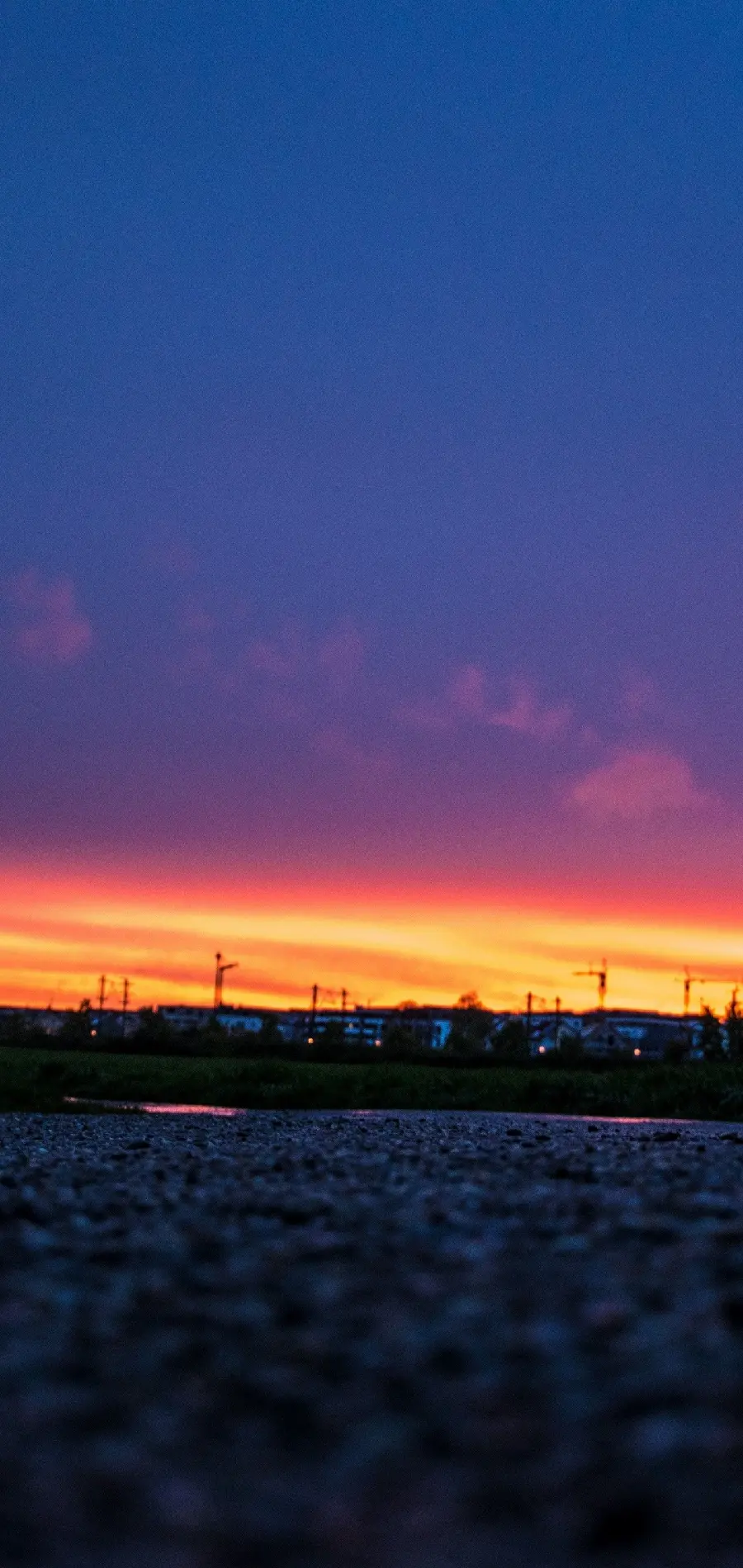 Background of the road and the sunset in the colorful sky