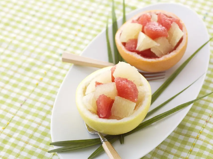 Delightful Tropical Summer Dessert of Fresh Fruit in Lemon Peel