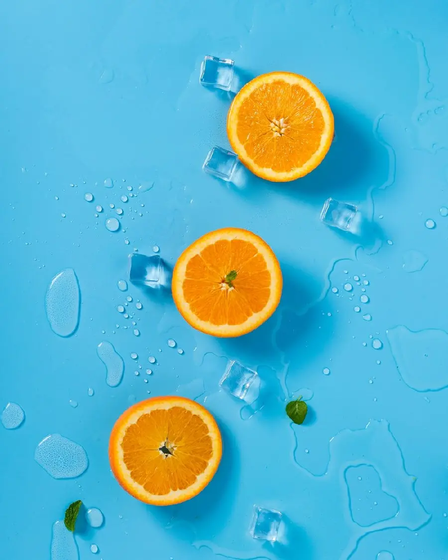 Funny Background Photo of Orange Oranges with Blue Background