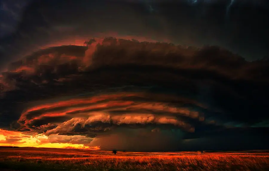Deadly tornado wallpaper in a black and orange sky