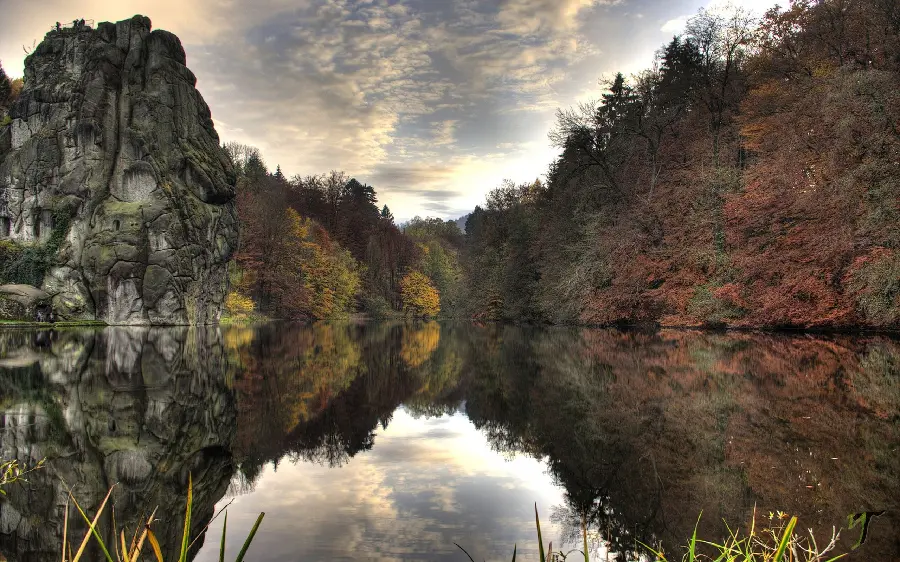 Interesting autumn nature and its reflection in the water in an artistic view