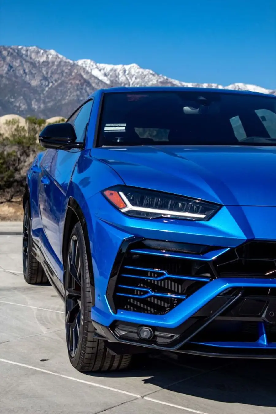 Blue Lamborghini SUV suitable for phone wallpaper with full HD quality