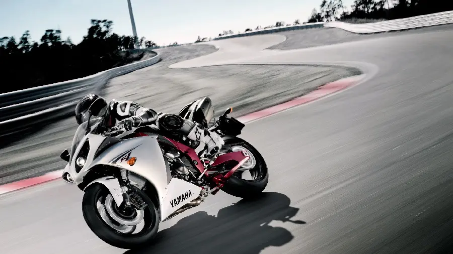 Cool motorcycle riding photo on the track