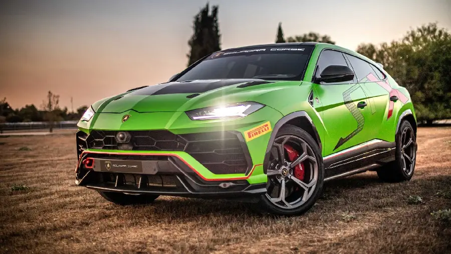 A very high quality photo of a green Lamborghini SUV