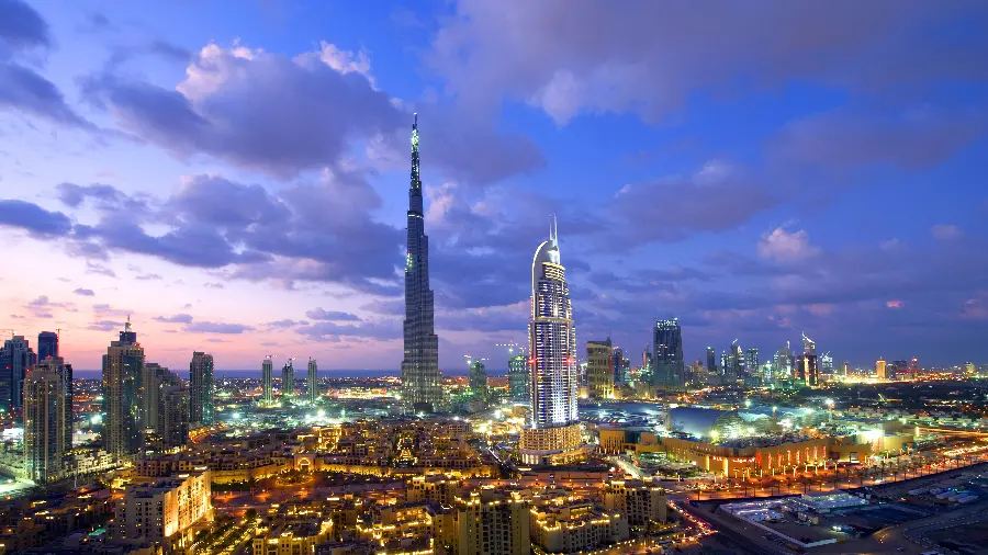 Download beautiful Dubai city background under purple sky