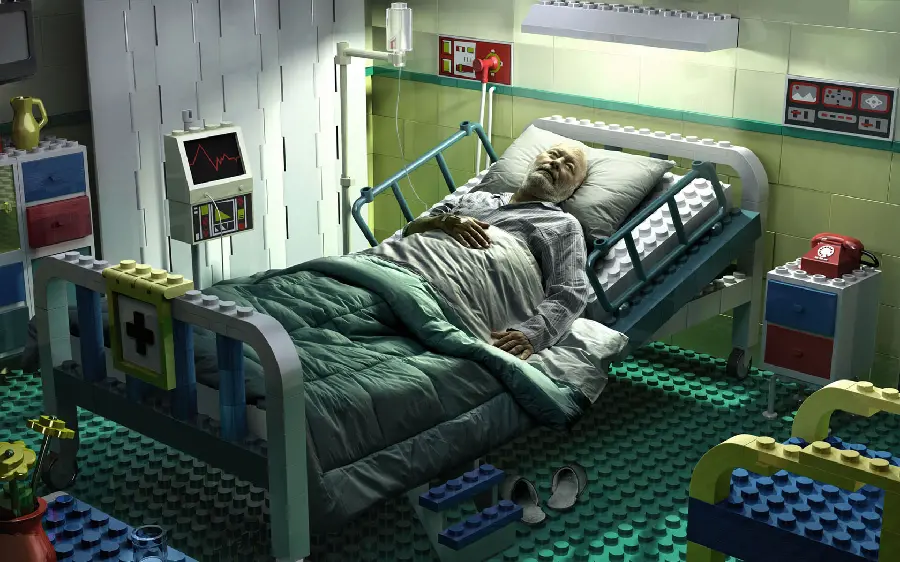 A super weird photo of an old man in a hospital with a toy structure 