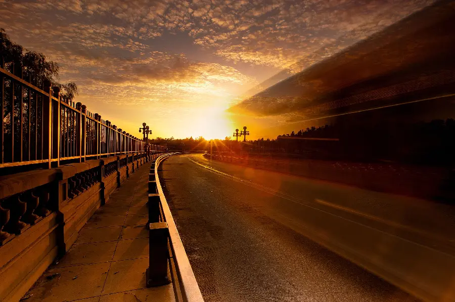 Download the background with the theme of the road and the sunset