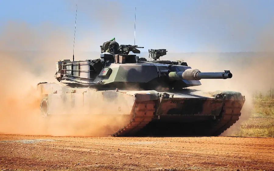 WallpaperExciting boy with a powerful tank design in the dirt