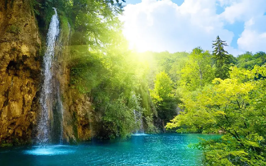Amazing laptop background of a sparkling waterfall in Full HD quality