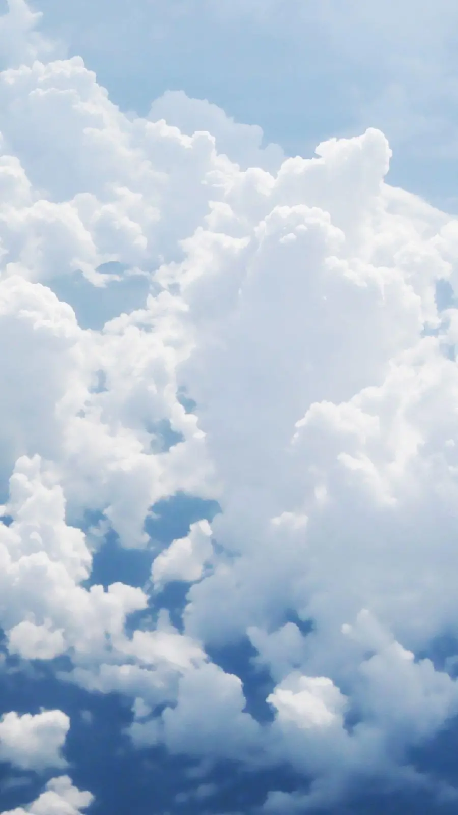 Large White Clouds Photo in Blue Sky