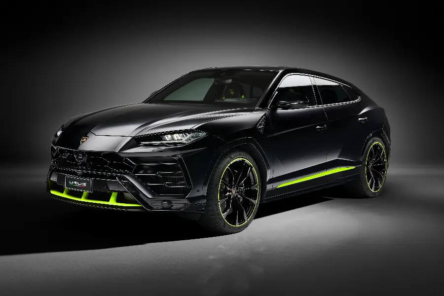 Black Lamborghini SUV with pistachio green trim and incredibly beautiful rims