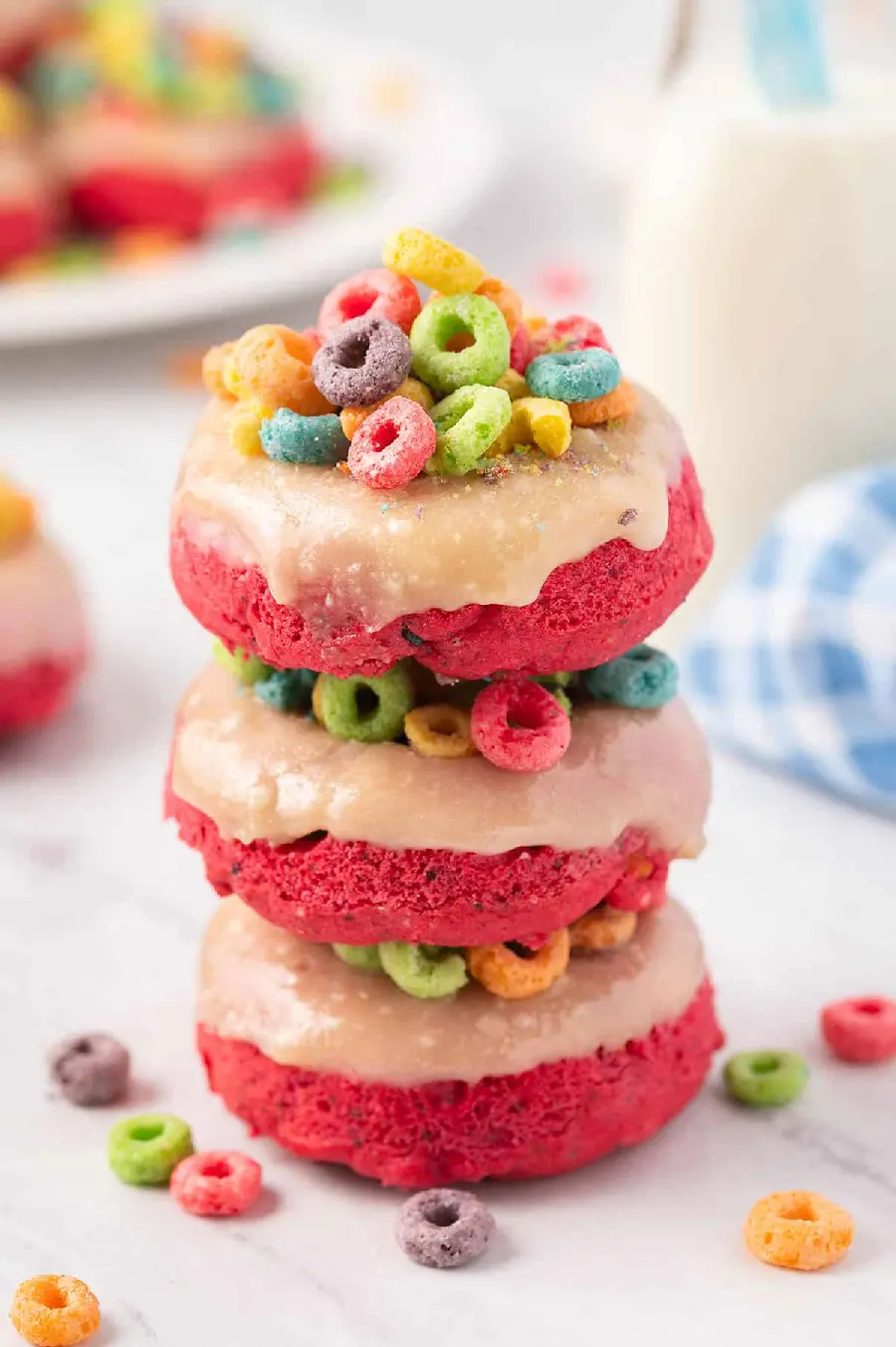 Interesting photo of fancy red donuts with rainbow decoration