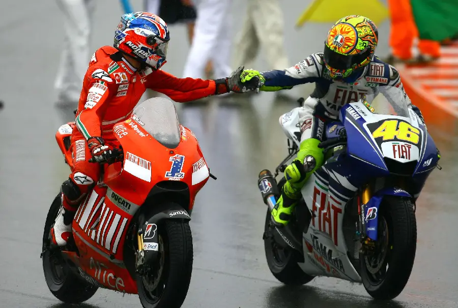 Beautiful photo of the friendship of racing motorcyclists