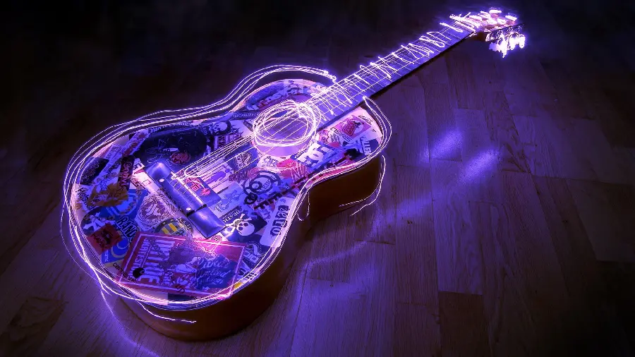 Shining purple guitar photo suitable for the new Mac OS X