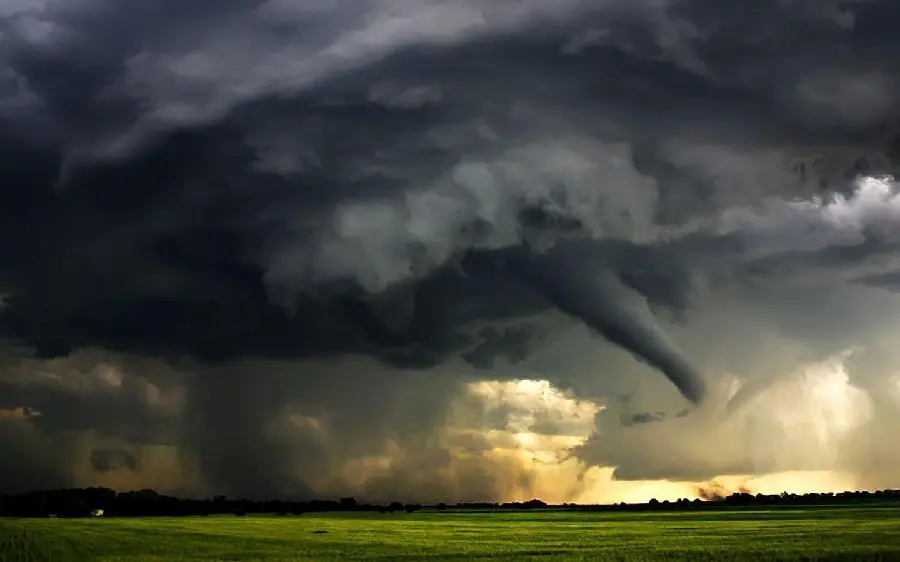  Beautiful Full HD frame of a tornado over a vast green plain