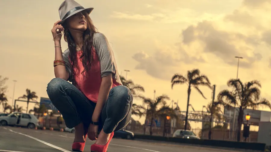 Picture of a beautiful woman in a red shirt and hat for Wallpaper