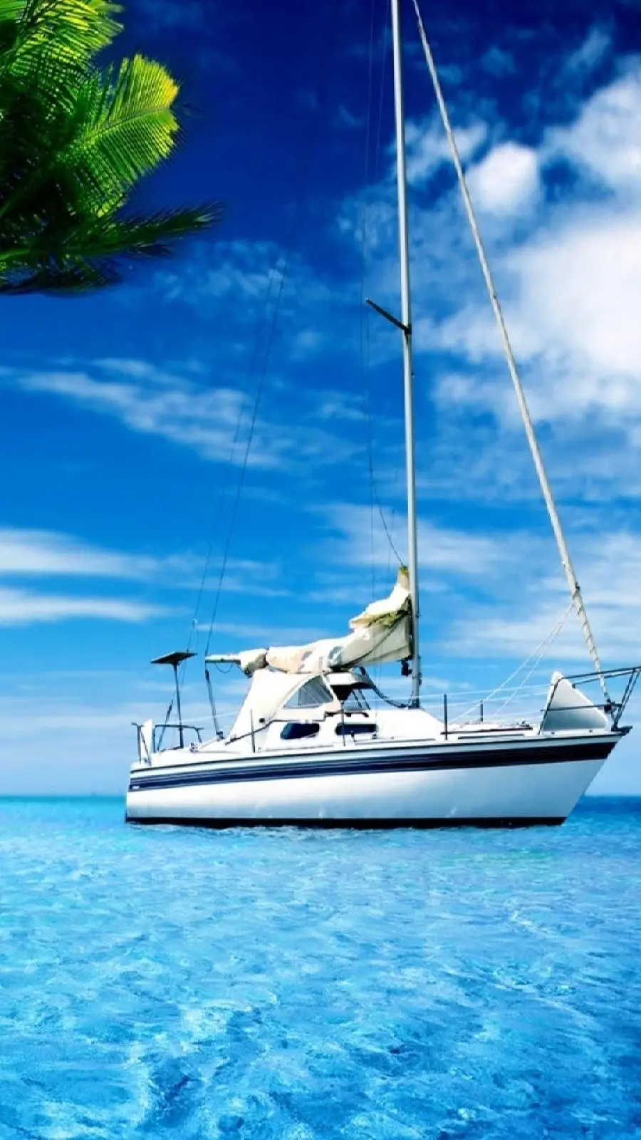 Download a luxurious white boat hd wallpaper on the sea suitable for mobile