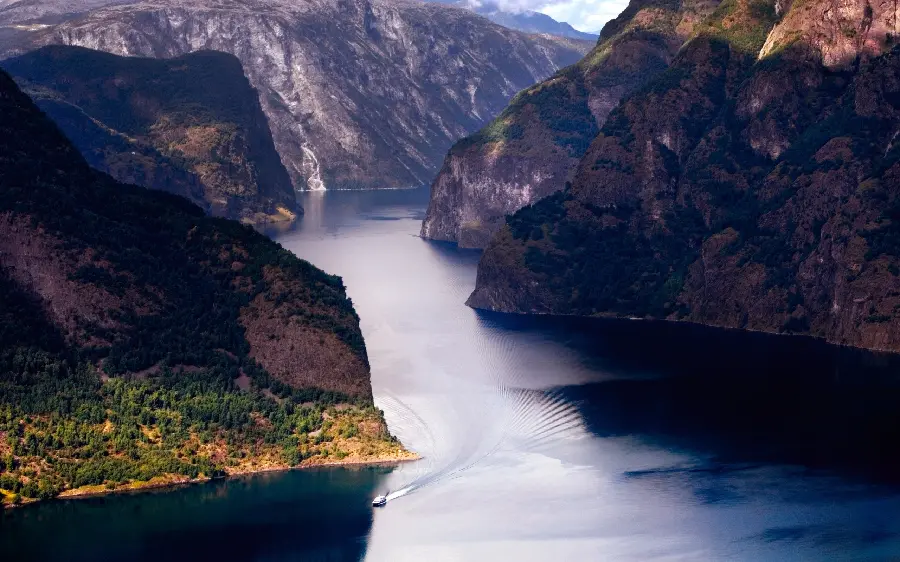 Photo of a wide river between the mountains for printing On the phone case