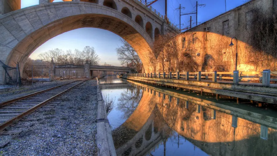 Awesome HD background of sunlight under a large bridge for laptops