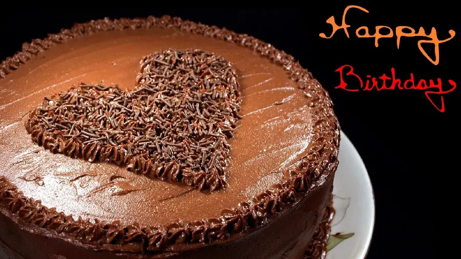 Heart-shaped chocolate cake for making a photo of a happy birthday 1402