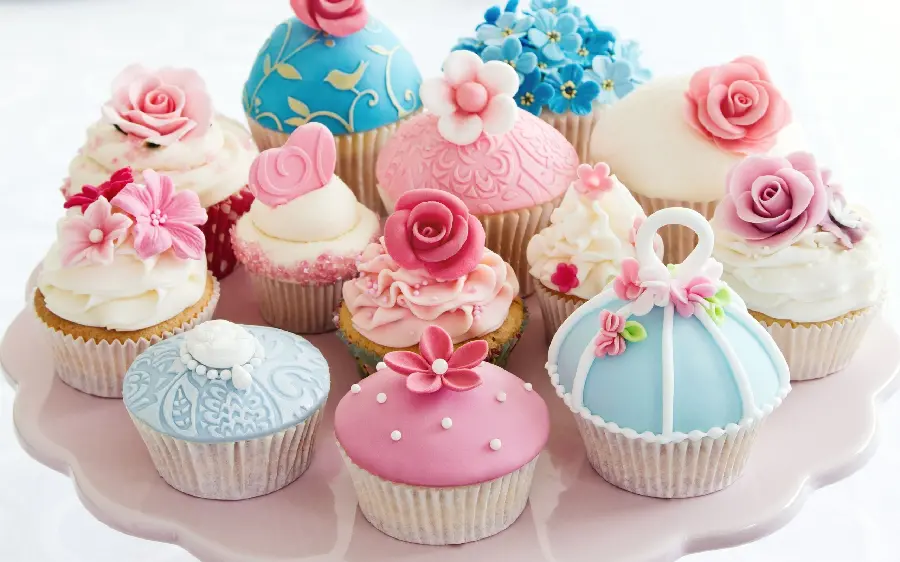 Download Background of beautiful miniature cupcakes