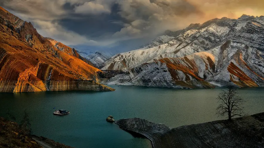 A very beautiful photo of nature with Beautiful river and a boat in the middle of it