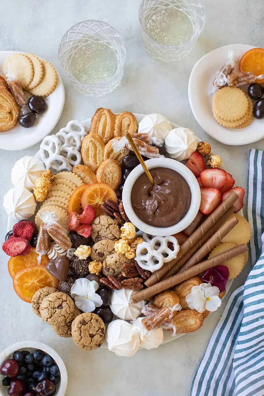 8K image of a large dessert tray with fruits and chocolates and delicious sweets