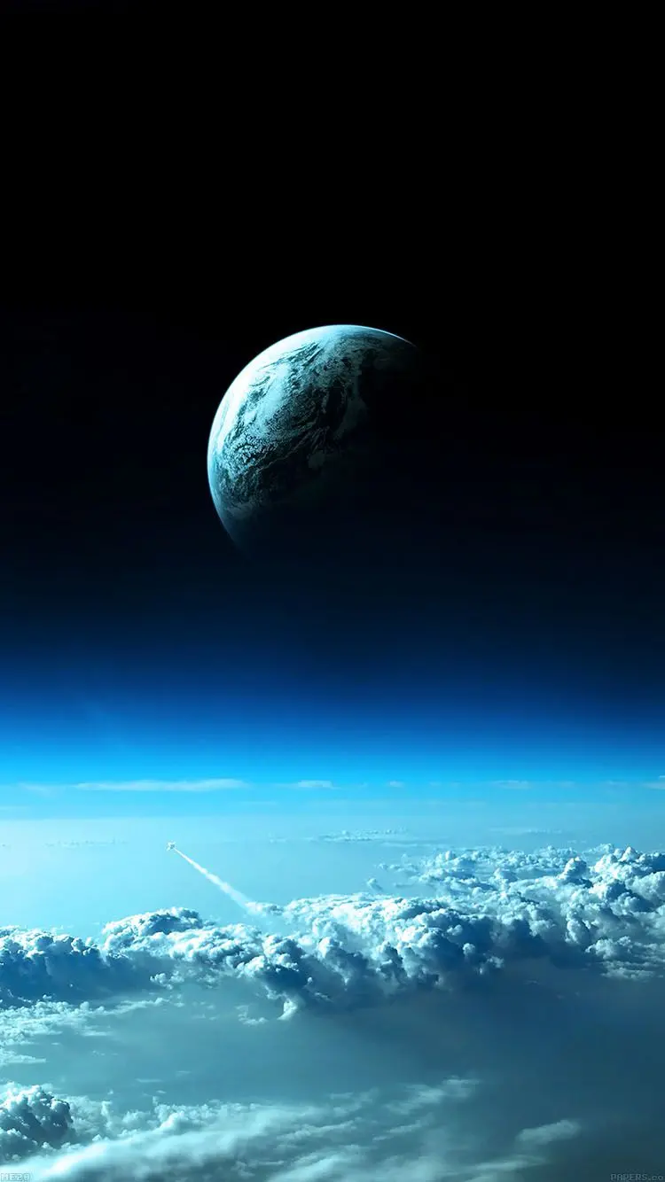 Download the magnificent blue Earth wallpaper above the clouds
