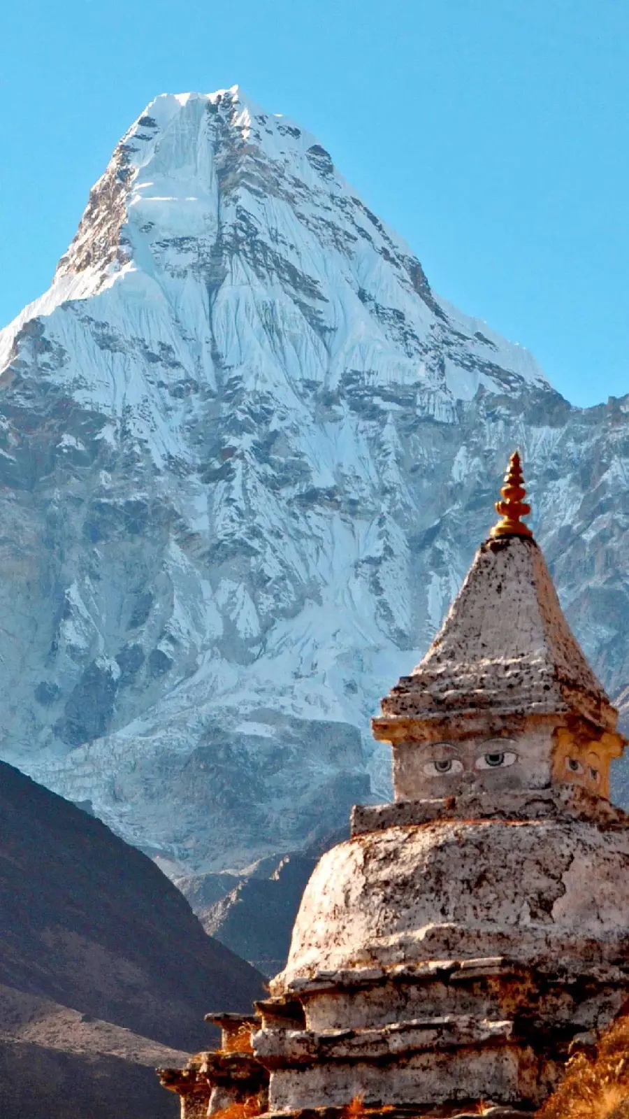 Photo of Buddha's eyes in a stone temple in the mountains of Tibet