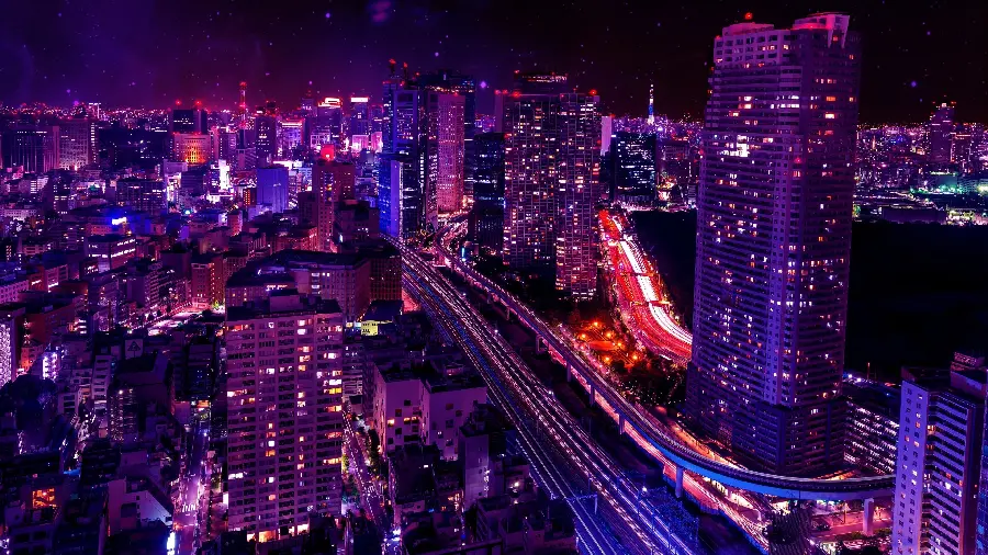 Aerial view of illuminated advanced city with purple sky