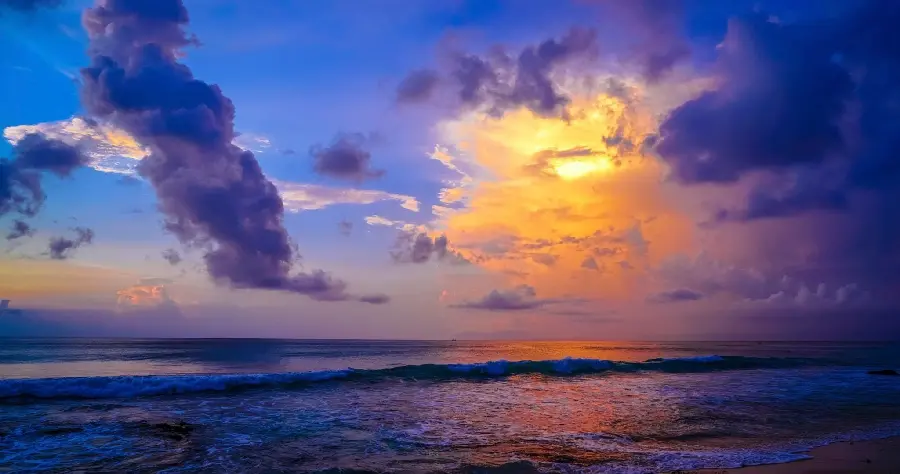 A masterpiece of the sea under the yellow and blue sky in Bali, Indonesia