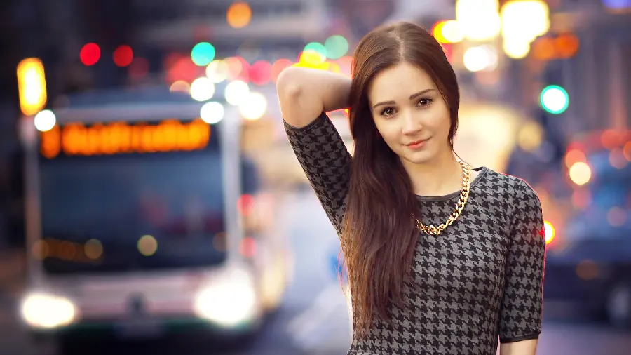 Picture of a foreign girl with brown hair with a kind and innocent face 2023