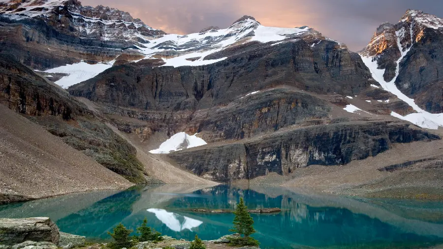 An interesting photo of snowy mountains and a beautiful lake suitable for wallpaper