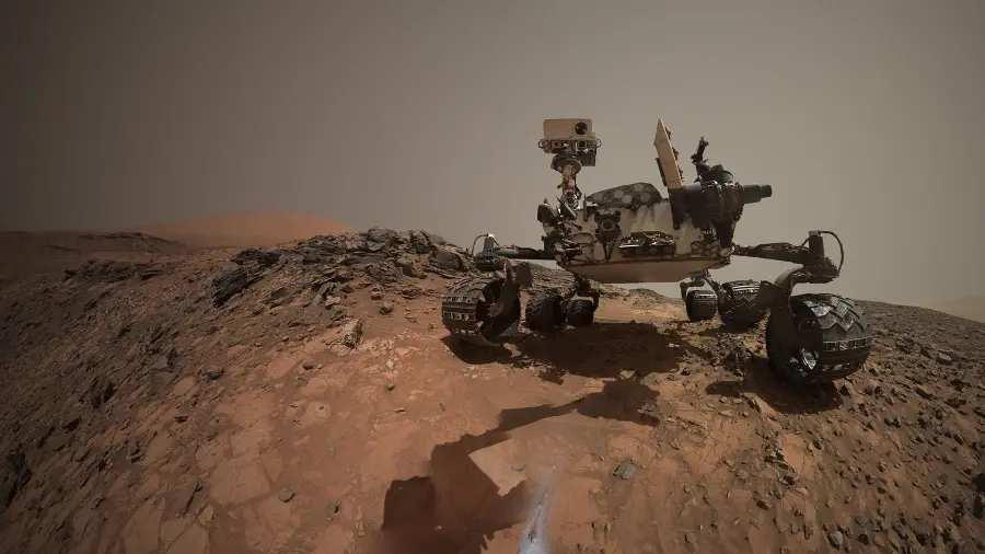 HD image of the Mars rover sampling the planet