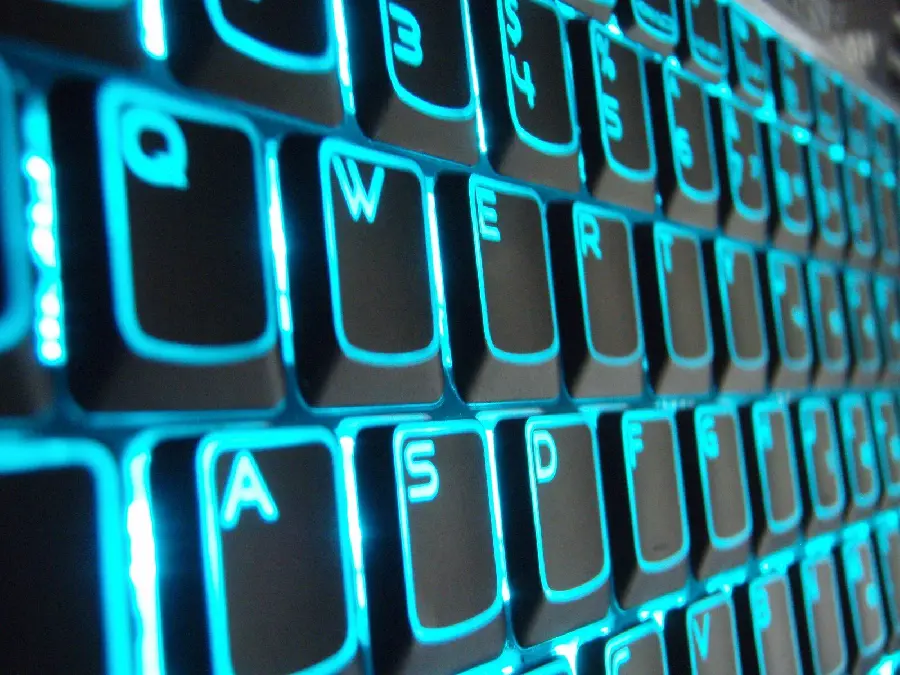 Glowing Blue Background of Keyboard and Keypad Buttons for Computer Science Enthusiasts