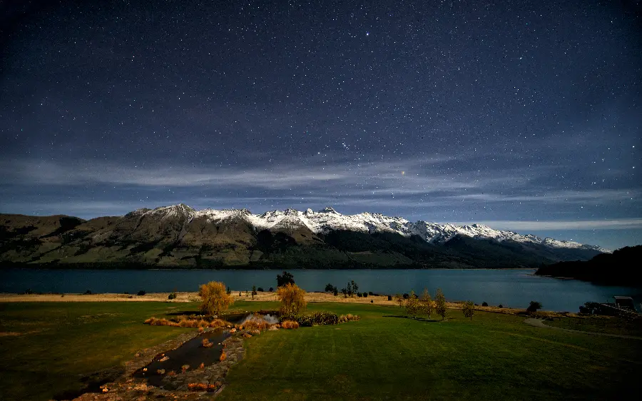 Nature full hd background of mountains and plains and sea under the starry sky of the night rain