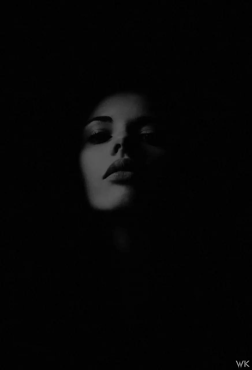 Attractive girl's face image from a low angle for a dark profile