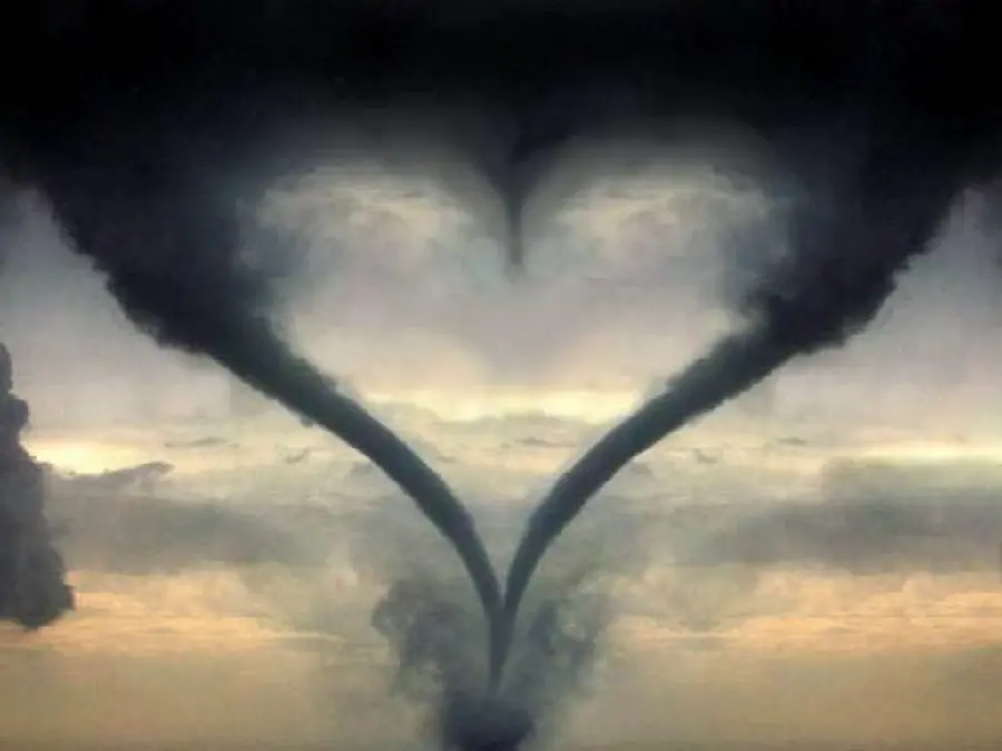 Full HD photo of a beautiful heart-shaped tornado in the sky