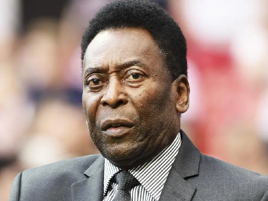 The latest photo of Pele in a high-quality suit