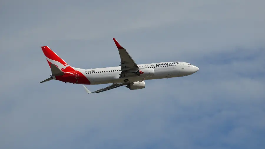 Beautiful and spectacular wallpaper of Red and white plane in the sky