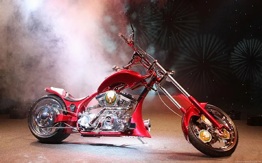 A photo of a red rabbit steering wheel motorbike