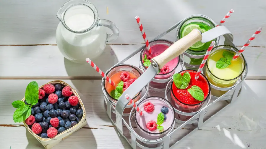 A motivational profile photo of colorful summer drinks