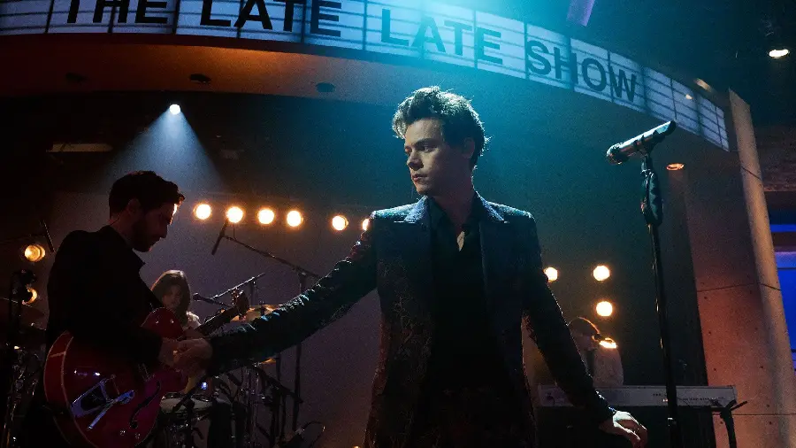 Handsome Harry Styles in a suit in a dreamy frame