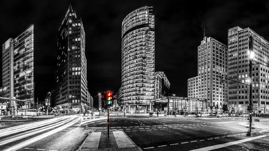 Download City Photo with Tall and Illuminated Buildings at Night