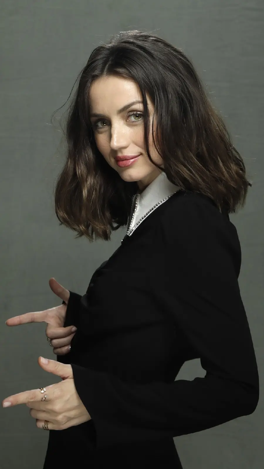 Funny and attractive picture Ana de Armas with a gun pose