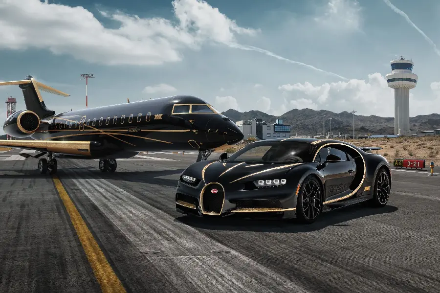 Luxury and luxurious photo of a private plane and a Bugatti in black