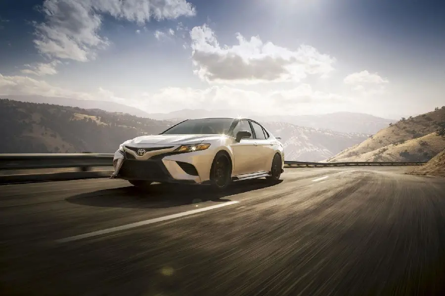 White Toyota Camry Photo in Road