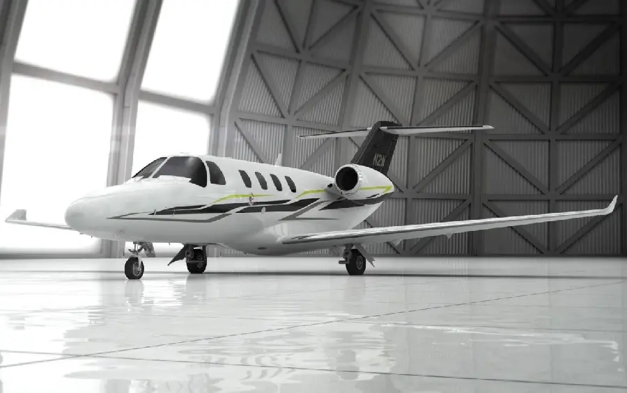 Photo of a private plane and a hangar